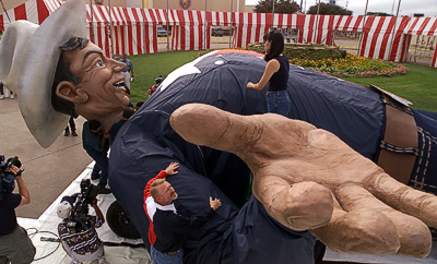 Big Tex laying flat on his back being prepared for the state fair