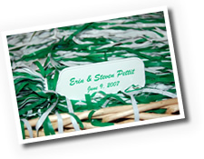 Green-and-white pom-poms served as wedding favors.