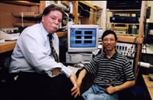Richard Borgens and Riyi Shi ('88 M.S.), assistant professor of basic medical science at Purdue