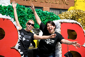 Parade float, two female students smiling