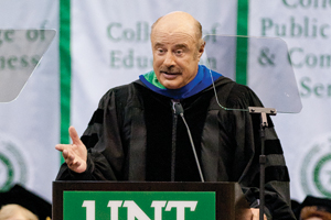 Phil McGraw ('76 M.A., '79 Ph.D.), host of the nationally syndicated Dr. Phil show, speaks in the Coliseum in May at UNT's master's and doctoral commencement ceremonies. (Photo by Jonathan Reynolds)