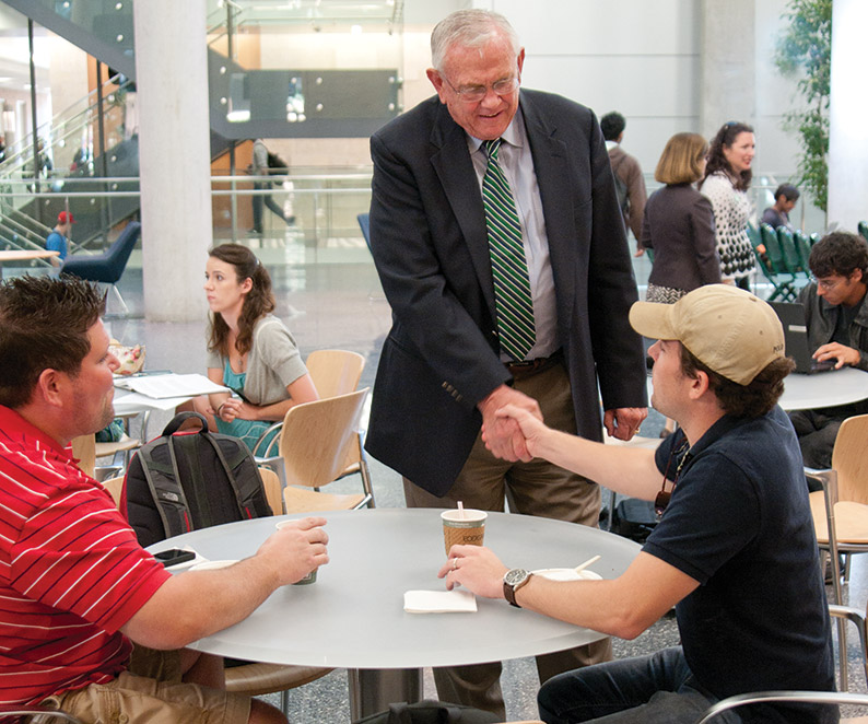 President V. Lane Rawlins visits with students and welcomes them back for the Fall semester. (Photo by Jonathan Reynolds)