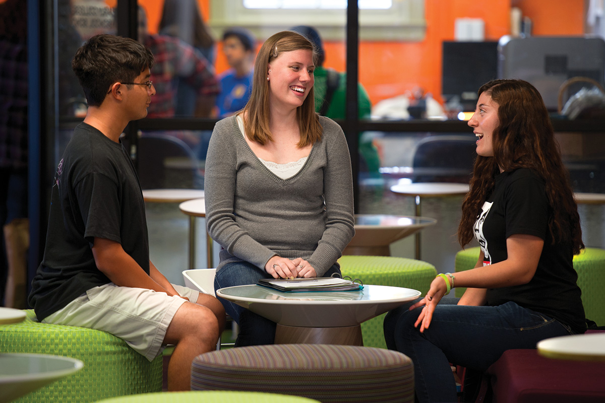 Ashley Hinck, a junior psychology major, middle, was an undecided major as a freshman, but after a First-Year Seminar class, she discovered her passion for counseling. Now she mentors freshmen Paul Barrera, left, and Lexi Montoya, right. (Photo by Gary Payne)