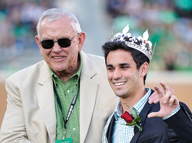 President V. Lane Rawlins with Homecoming king David Wolpert  at Homecoming. (Photo by Michael Clements)