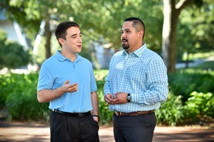 From left to right, UNT student Daniel Ford talks with transfer advisor Adrian Riojas (Photo by Michael Clements)