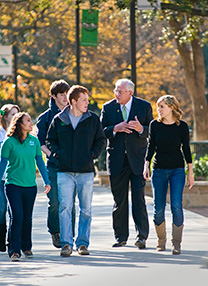 President V. Lane Rawlins visits with students on campus. (Photo by Jonathan Reynolds)