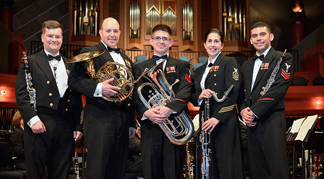 From left, Senior Chief Musician Jim Logan, clarinet; Musician First Class Jason Ayoub, principal horn; Musician First Class Philip Eberly, euphonium; Chief Musician Cynthia Wolverton, bass clarinet; and Musician First Class Joshua Arvizu, oboe, are UNT alumni who are happy to perform with the U.S. Navy Band, one of several elite military bands that count roughly 100 College of Music alumni as members. (Photo by Michael Clements)