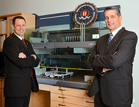 From left, Douglas Hares ('91, '98 Ph.D.) and John E.B. "JEB" Stewart ('88 M.S., '96 Ph.D.). (Courtesy of the FBI)