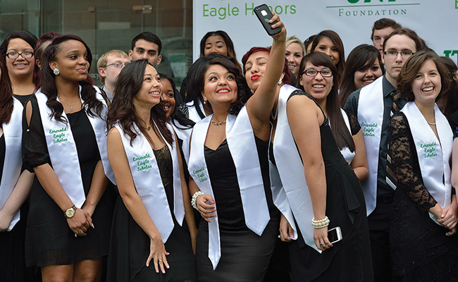 Emerald Eagle Scholars take a selfie while enjoying the event. (Photo by Michael Clements)