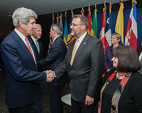 Secretary of State John Kerry shaking hands with UNT's Vice Provost for International Affairs Richard Nader. Courtesy of the U.S. Department of State