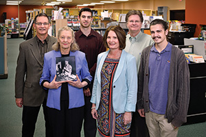 Pender's Music Co. & Music 1st - From left, Richard Gore ('80), Betty Gore, Steven Gore ('10), Becky Wenzel Gore ('81), Ray Gore ('82, '83 M.B.A.) and David Gore carry on the family music business founded by patriarch Harold Gore in Denton, Southlake and Frisco. (Photo by Michael Clements)