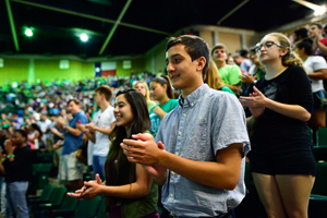 A group of incoming students listen to President Neal Smatresk during the new student convocation. (Photo by Michael Clements)