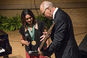 Alumna Norah Jones receives the Presidential Medal of Honor from UNT President Neal Smatresk (Photo by Ahna Hubnik)