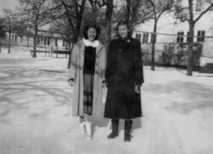 Evelyn, left, and friend Audrey Sommers ('51) in the snow behind the Harriss Gym, January 1949.