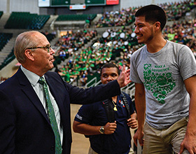 President Neal Smatresk greets students at this fall's New Student Convocation. (Photo by Michael Clements)