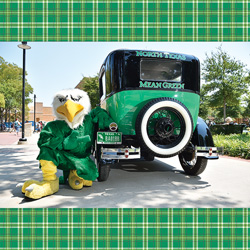 UNT mascot Scrappy beside the Mean Green Machine Model T (Photo by Michael Clements)