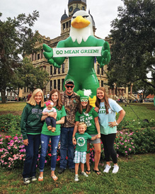 The Larriviere family with Scrappy at the Denton courthouse.