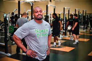 Former Mean Green player Jamize Olawale, now a fullback for the NFL's Oakland Raiders, is working out with the football team this spring. (Photo by Michael Clements)
