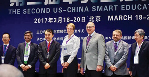 College of Information Dean Kinshuk, left, and UNT President Neal Smatresk, second from right, attended the U.S.-China Smart Education Conference in Beijing, China, this spring. (Photo by Edem Dahlstrom)