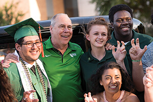 President Neal Smatresk celebrates the Class of 2017 at the inaugural UNT Graduation Block Party. (Photo by Ahna Hubnik)