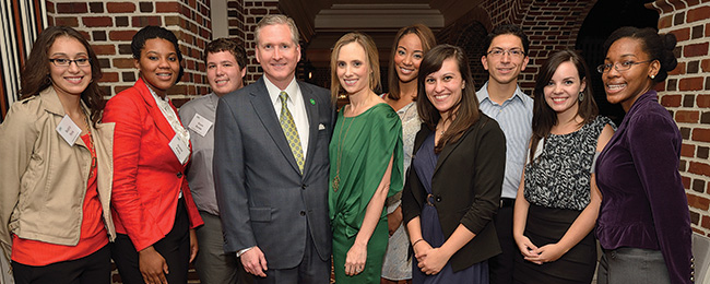 The Ryans (center) are pictured with Emerald Eagle Scholars Beatriz Peña, Joanie Paley, Kevin Banke, Autumn Grisby, Sarah Reynolds, Rudy Reynoso, Allysse Fisher-Shank and Salome Clarke. (Photo by Michael Clements)