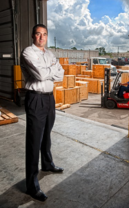 John Magee (&rsquo;94) has helped build Crane Worldwide Logistics into a global trade and transportation powerhouse in 19 countries. (Photo by Angilee Wilkerson)