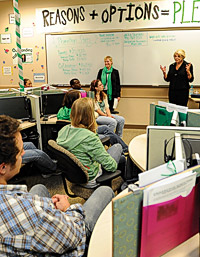 President Gretchen M. Bataille talks with Call Mean Green students. (Photo by Michael Clements)