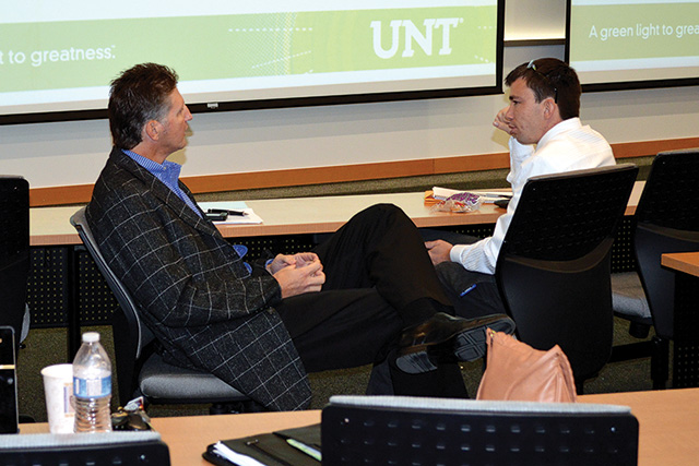 Finance and operations management senior Roy Mannix, right, meets with his mentor, Ray White, chief performance officer/partner at Dallas-based Reinvention, through the Professional Leadership Program. (Photo by Janae Denman)