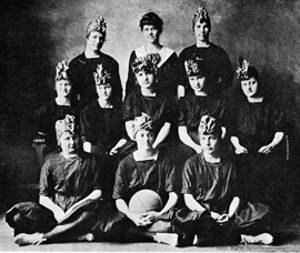 Women's basketball coach Beulah Harriss (top center) poses with the 1918-19 North Texas team.