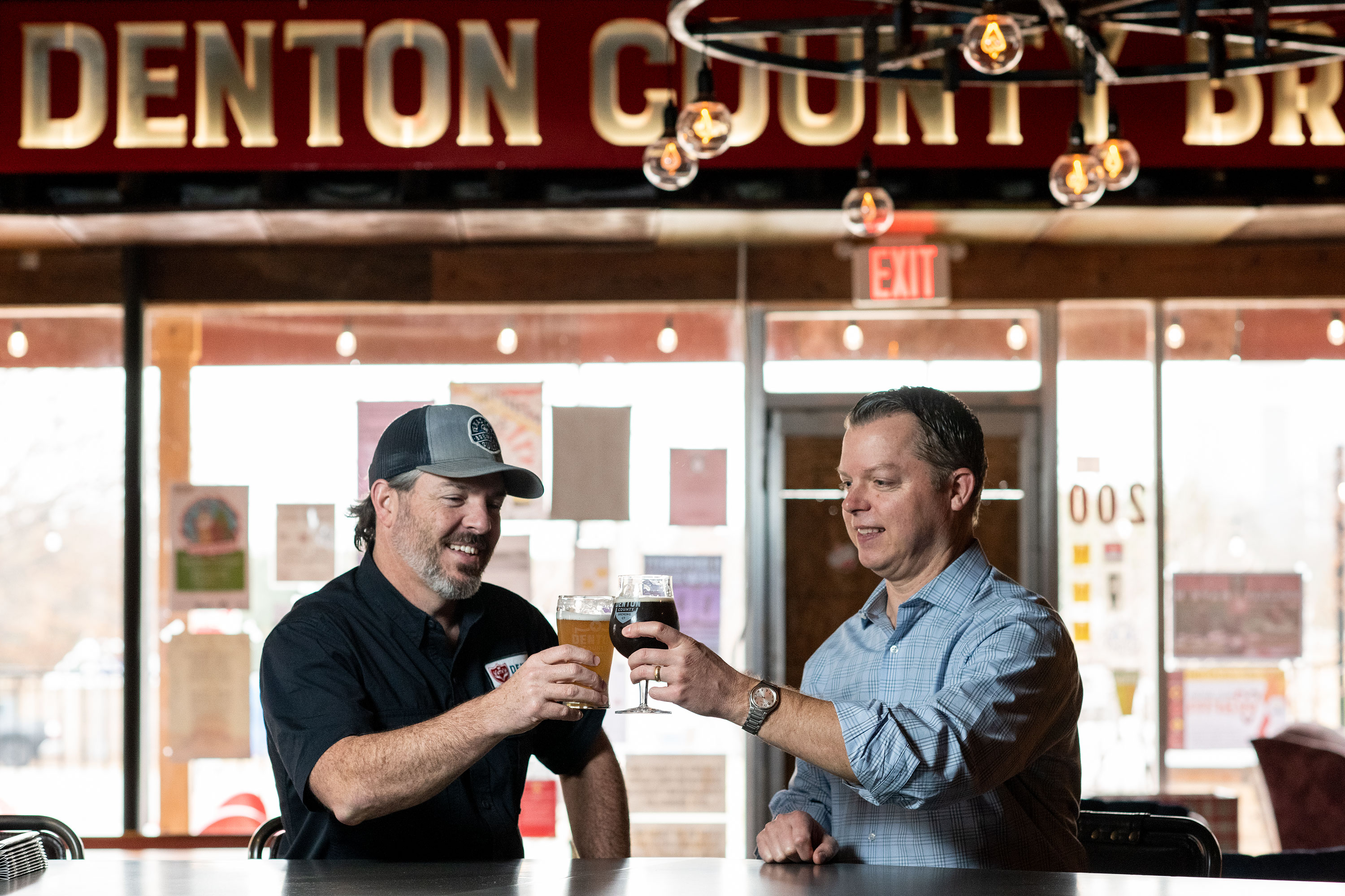 Seth Morgan and Mike Barnett inside Denton County Brewing Co.