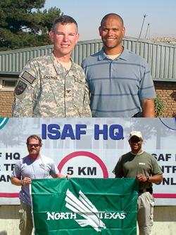 Top, from left, Capt. Kevin Callahan, U.S. Navy, UNT associate professor of educational psychology, and Anthony Carter ('94). Bottom, from left, Deputy U.S. Marshal Paul Denton (&rsquo;91) and Anthony Carter.
