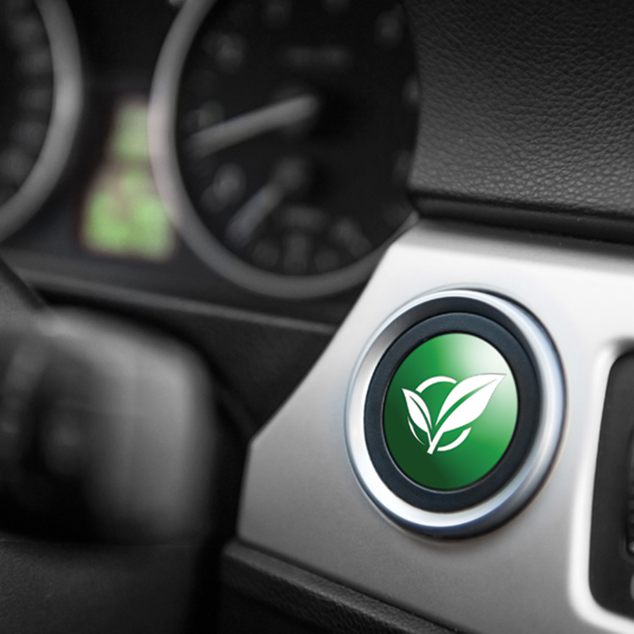 Car dashboard with a green ecology button