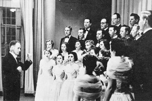 Frank McKinley directs the A Cappella Choir in 1955-56. &ldquo;Mr. Mac,&rdquo; who led the choir for more than 30 years, was among many outstanding music teachers who joined North Texas in the 1940s.