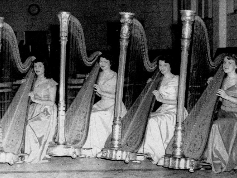 Students playing harp 