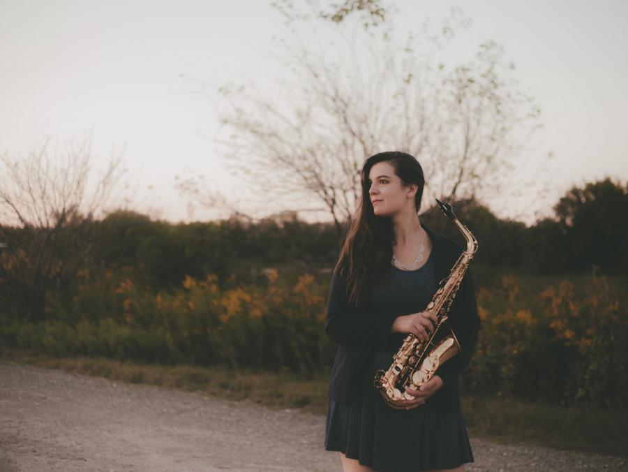 Jessica Rose Dodge with a saxophone