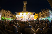 Concert being held in an Italian city at night