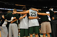basketball players in a huddle