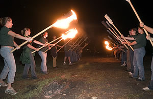 Students prepare to light the bonfire