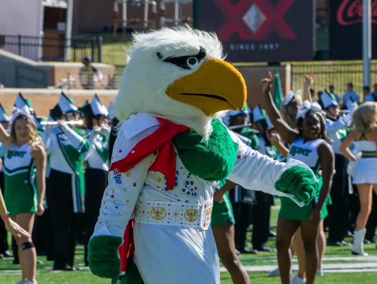 Eagle mascot in an Elvis-style jumpsuit