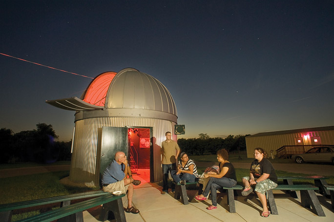 Students visit the Rafes Urban Astronomy Center. (Photo by Jonathan Reynolds)