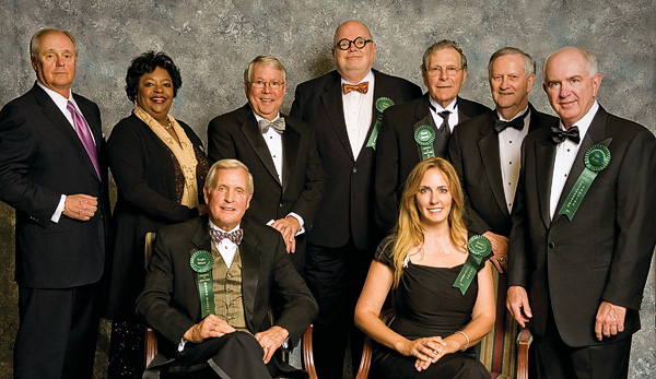 Standing from left:  Rhys J. Best ('69), Delva Cotton King ('72), John Robert “Bobby” Ray ('69), Cragg Hines ('67), Michael McMillen ('58) and Joe Roy with Global Interact, and John Moranz ('71, '72 M.B.A.). Seated from left:  E. Douglas McLeod ('65) and Kristin Farmer ('95 M.Ed.). Not pictured: Judith Garrett Segura ('70 M.A.,'77 M.F.A.). (Photo by Jonathan Reynolds)