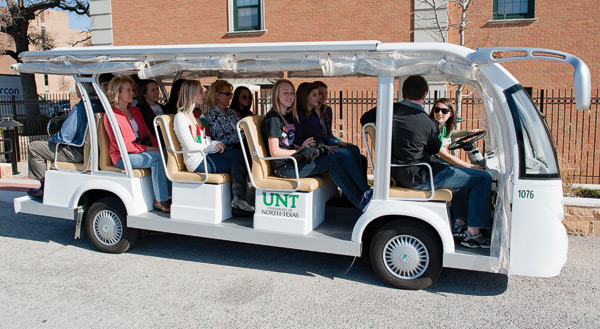 Campus tours now include a riding portion as well as a walking portion, thanks to an electric 14-passenger university tram. Led by Eagle Ambassadors, students trained in all things UNT, tours still last about 90 minutes but cover almost twice as much ground. Call 940-565-4104 or visit <a href="http://ww.tours.unt.edu">tours.unt.edu</a>.  (Photo by Michael Clements)