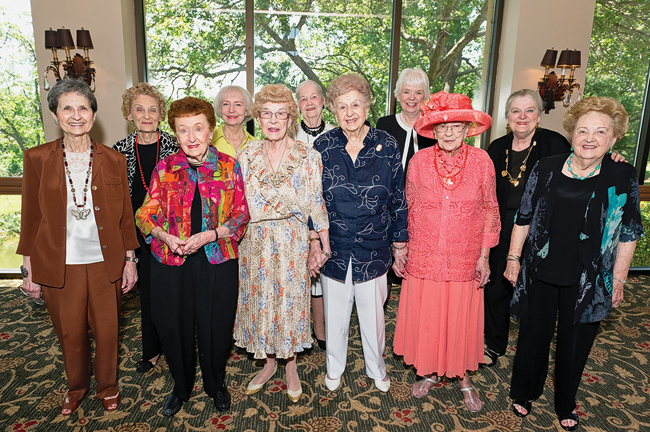 From left, front, Betty Salem Korioth (’53), Kathryn Caldwell Eubanks (’43), Dorothy Lee Dillon Vestal (’36), Wilma Jo West Bush (’36), Loretta Smith Hudspeth (’41), Mary Elizabeth Hopkins Hill (’47); back, Sherry Milholland Thompson (’46), Joyce Bynum Smith (’54), Peggy Click Mallick (’51), Ann Embry Koenig (’56), Rose-Mary Brau  Rumbley (’52, ’53 M.Ed.,  ’70 Ph.D.) (Photo by Michael Clements)