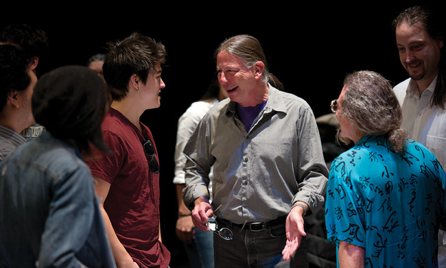 Frank Zappa band members, bassist Arthur Barrow (75), middle, and keyboardist Tommy Mars, right, talked to students enrolled this spring in the Music of Frank Zappa class. Joseph Klein, chair of the composition studies division, began teaching the class in 2001. (Photo by Gary Payne)
