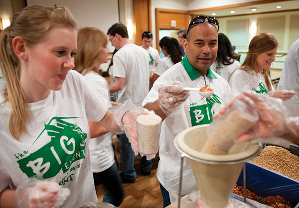 Members of the UNT Alumni Association helped prepare food packages for Stop Hunger Now as part of this year's Big Event. (Photo by Gary Payne)