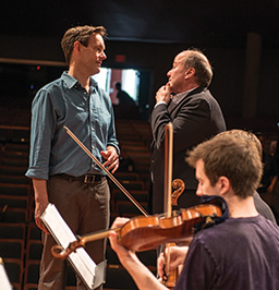 From left, Jake Heggie and internationally renowned tenor Richard Croft discuss the rehearsal of Heggie's "Ahab Symphony," which premiered April 24 at UNT. (Photo by Jonathan Reynolds)