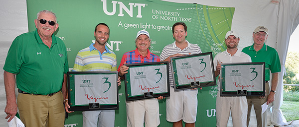 UNT's College of Business hosted its third annual Golf Classic at The Vaquero Club in Westlake to raise money to benefit its inspiring students and educational programs. From left, President V. Lane Rawlins, John Wolfner, Doug Brooks, Taylor Brooks, Preston Phillips and Dean Finley Graves. (Photo by Michael Clements)