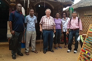 From left, Oscar Atumah; Nassiru Eplong with NUC; UNT faculty members James Swan and Ami Moore; liaison Emem Omokaro; and UNT Dallas faculty member Iftekhar Amin visit a Nigerian market. (Photo by Keith Turner)