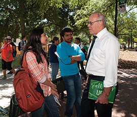 President Neal Smatresk visits with students on the first day of fall classes. (Photo by Gary Payne)