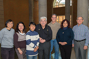 From left, Acharawan Thongmee ('99 Ph.D.), Roxana Bejarano Hughes ('97 M.S.), Patamaporn Sukplang ('00 Ph.D.), Professor Emeritus G. Roland Vela, John Rainey ('71 M.S.), Guadalupe Virginia Nevárez-Moorillón ('95 Ph.D.), Joel Escamilla ('80 Ph.D.). (Photo by Ahna Hubnick)